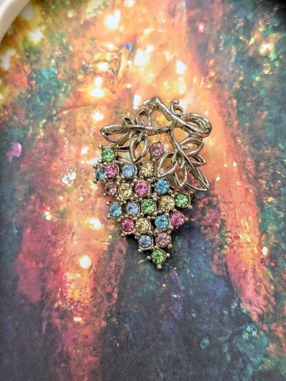Mid-century vintage grape cluster brooch with colorful rhinestones